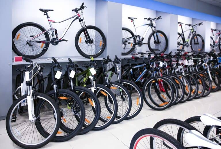 A variety of modern bicycles on display at a store.