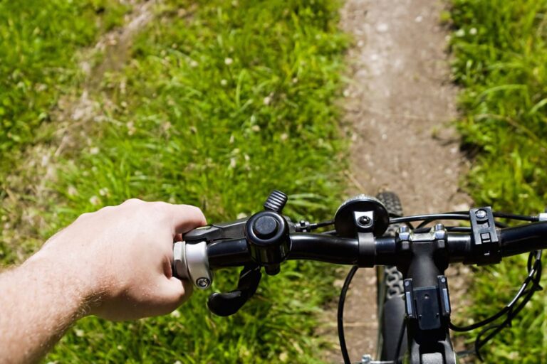 A person biking on a sloping terrain.