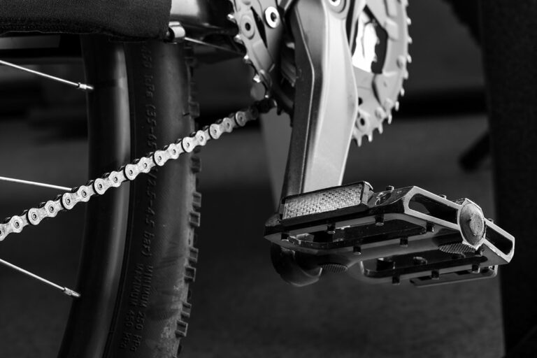 Thin metal pedal of a bike.