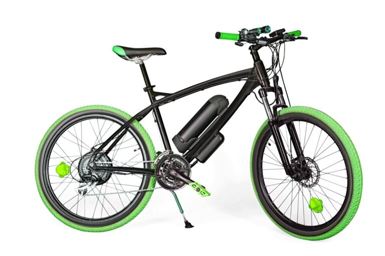 An electric bike with green wheels.