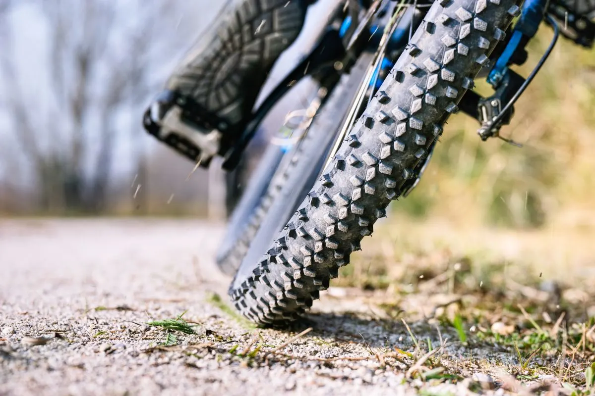 A close up view of a mountain bike on action.