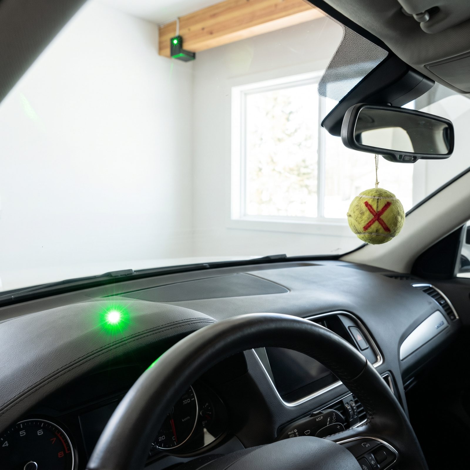 A Ceiling-Mounted Laser Parking Guide