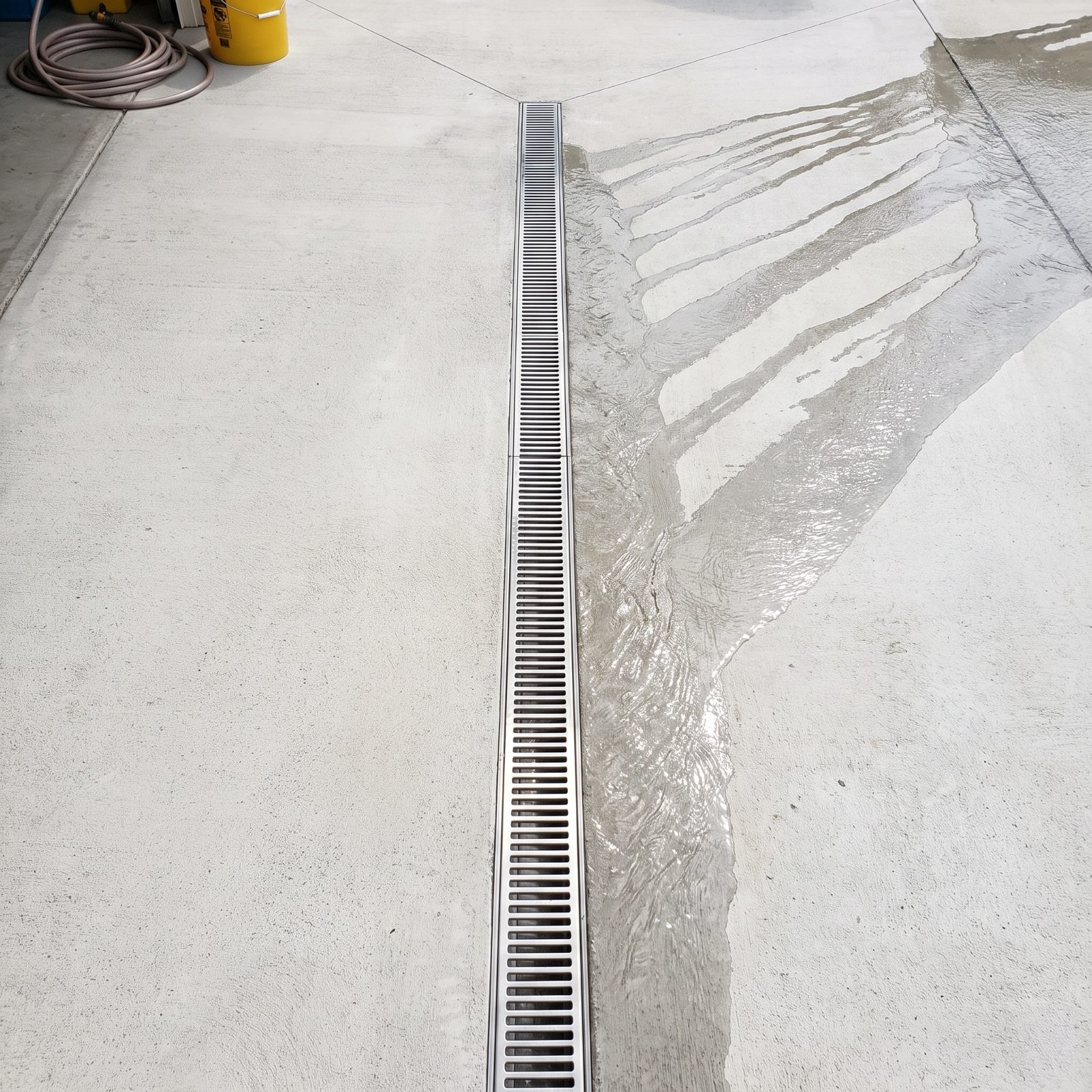 Sloped Floor With a Central Trench Drain